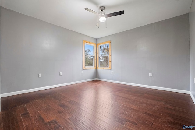 spare room with ceiling fan and hardwood / wood-style flooring