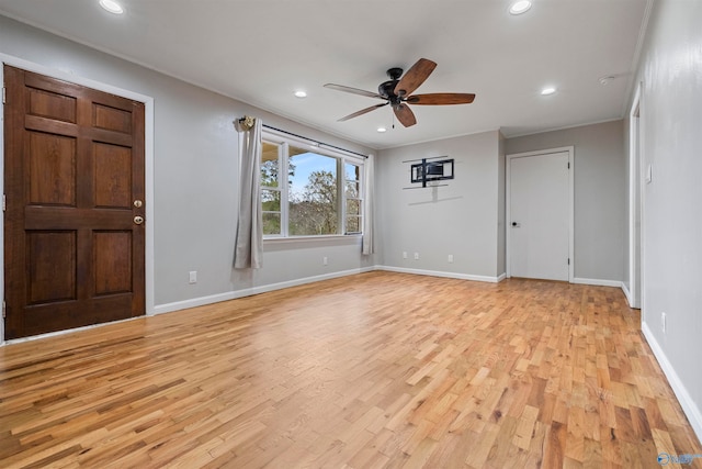 entrance foyer featuring ceiling fan and light wood-type flooring