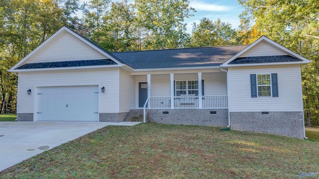 ranch-style home with a porch, a front yard, and a garage