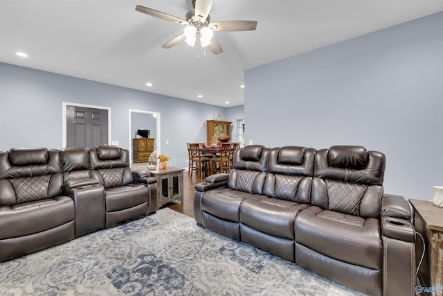 interior space featuring wood-type flooring and ceiling fan