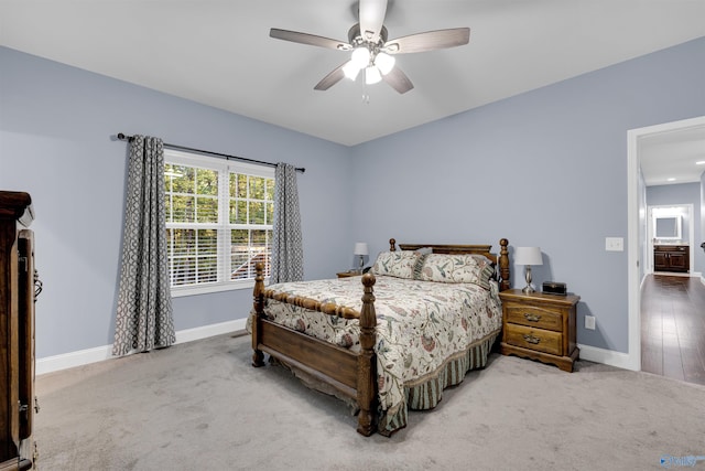 bedroom featuring hardwood / wood-style floors and ceiling fan