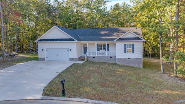 single story home featuring a porch, a front lawn, and a garage