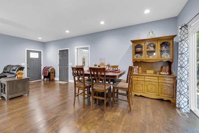 dining space featuring hardwood / wood-style floors