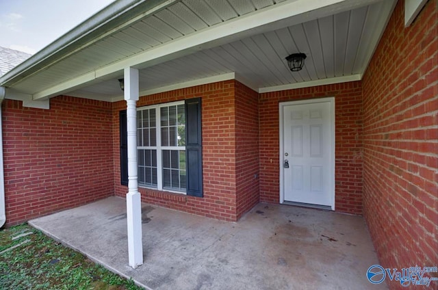 entrance to property with covered porch