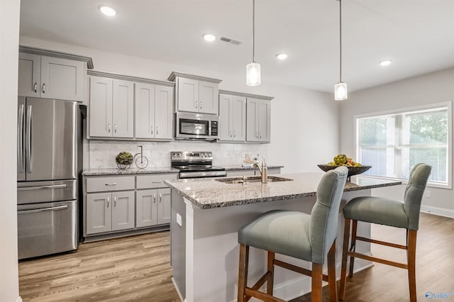 16821 Demi Dr, Athens, AL 35613 - kitchen featuring stainless steel appliances, gray cabinets, a sink, and recessed lighting