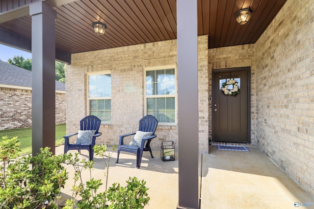 16821 Demi Dr, Athens, AL 35613 - view of exterior entry featuring brick siding and covered porch