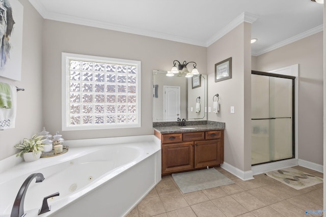 full bathroom featuring vanity, a tub with jets, a stall shower, and ornamental molding