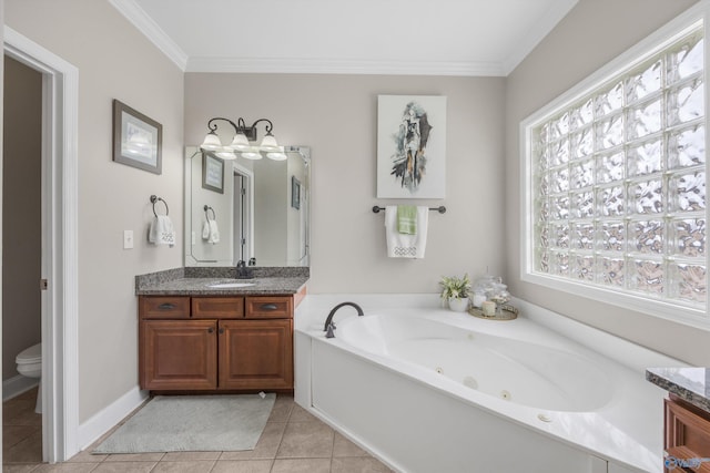 bathroom featuring vanity, crown molding, a healthy amount of sunlight, and a whirlpool tub