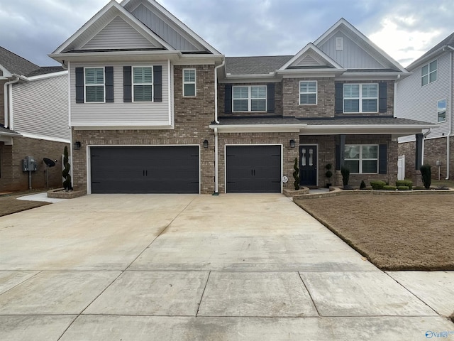 craftsman-style home featuring a garage