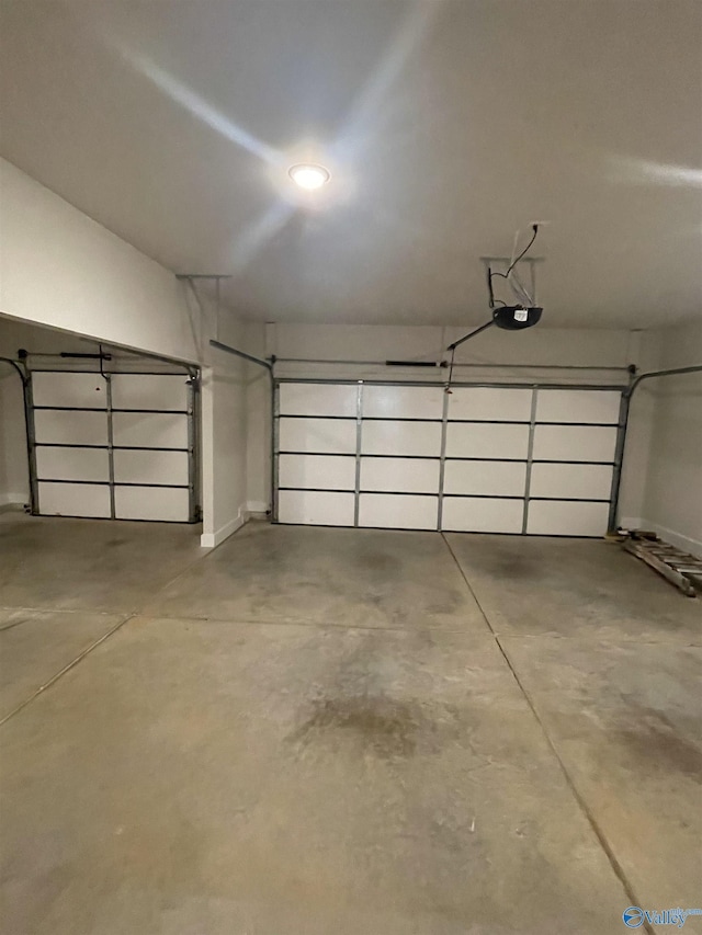 garage featuring a garage door opener