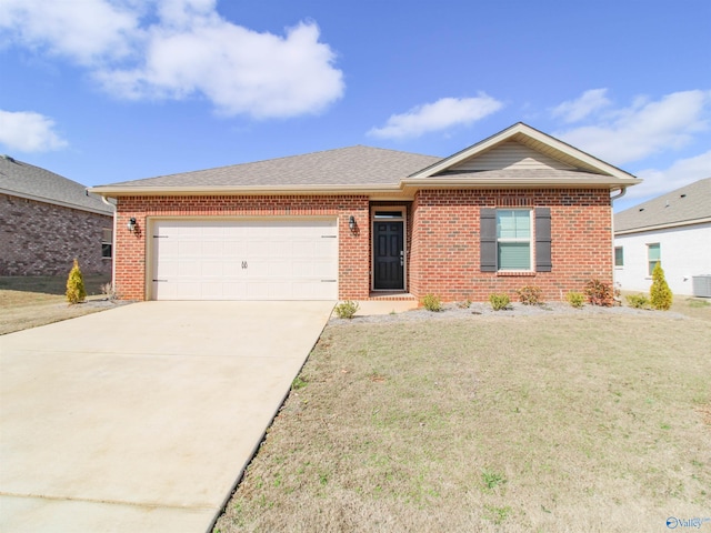 single story home with a garage and a front lawn