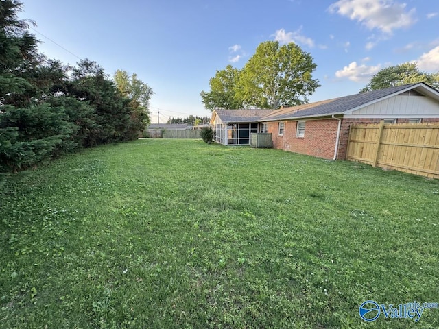 view of yard featuring a fenced backyard