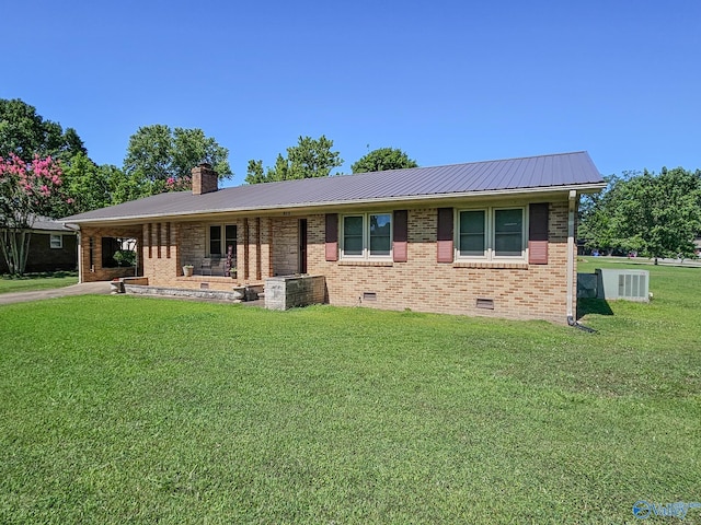 ranch-style home featuring a front yard