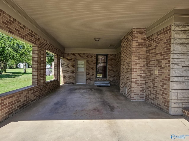 view of patio / terrace featuring a carport