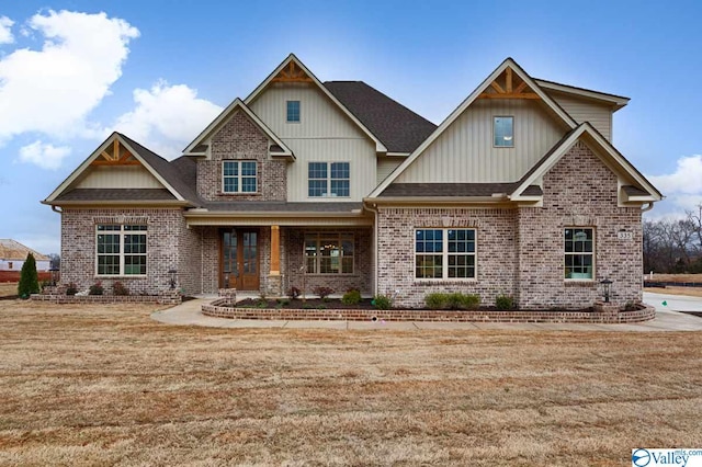 craftsman-style home with a front lawn