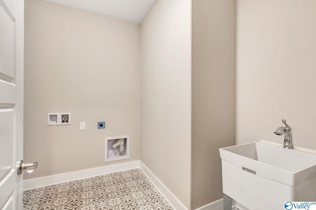 laundry area featuring sink, hookup for a washing machine, hookup for an electric dryer, and light tile patterned floors