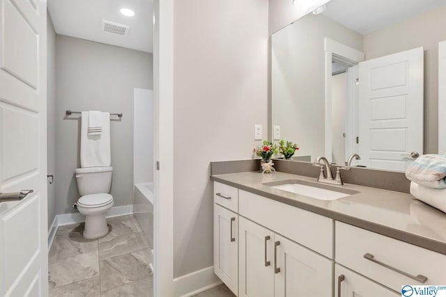 full bathroom with vanity, bathtub / shower combination, and toilet