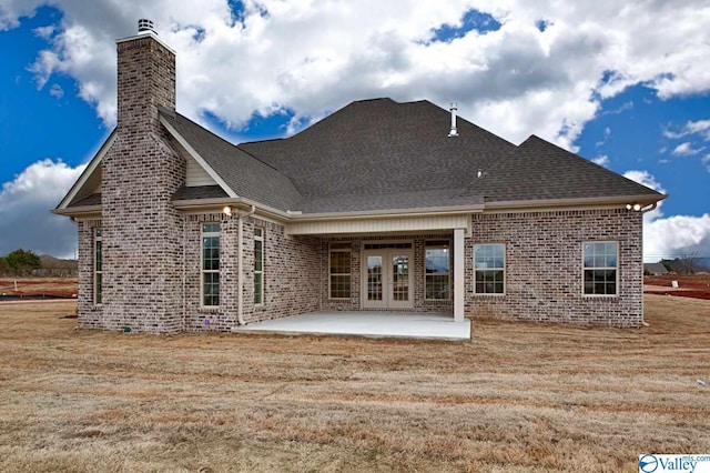 rear view of house with a patio area