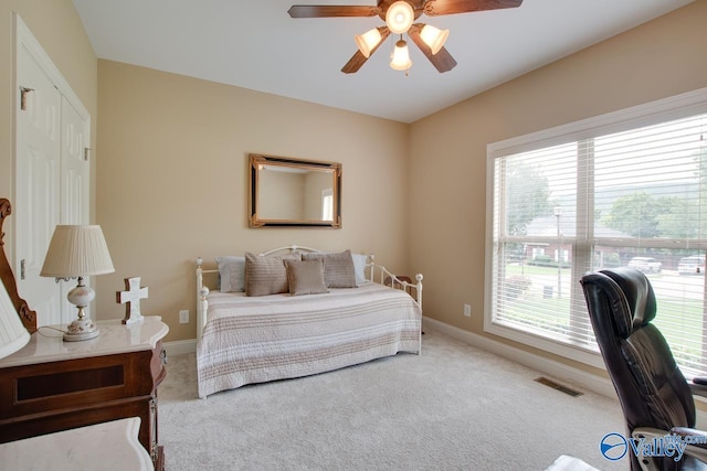 2701 Arbor Oak Dr SE, Owens Cross Roads, AL 35763 - carpeted bedroom with baseboards and ceiling fan