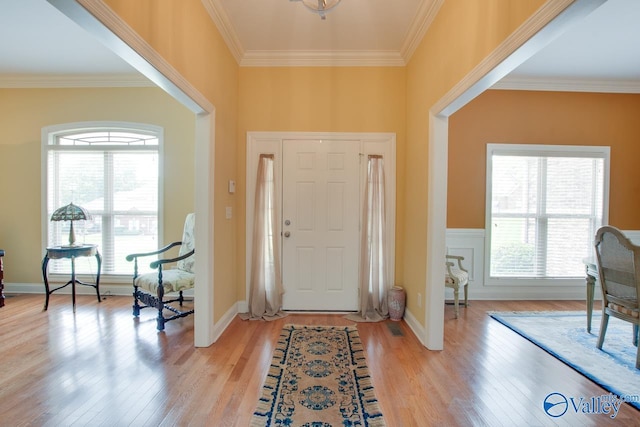 2701 Arbor Oak Dr SE, Owens Cross Roads, AL 35763 - foyer entrance featuring light wood-type flooring and crown molding