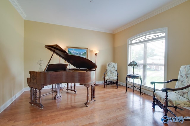 2701 Arbor Oak Dr SE, Owens Cross Roads, AL 35763 - sitting room featuring crown molding, wood finished floors, and baseboards