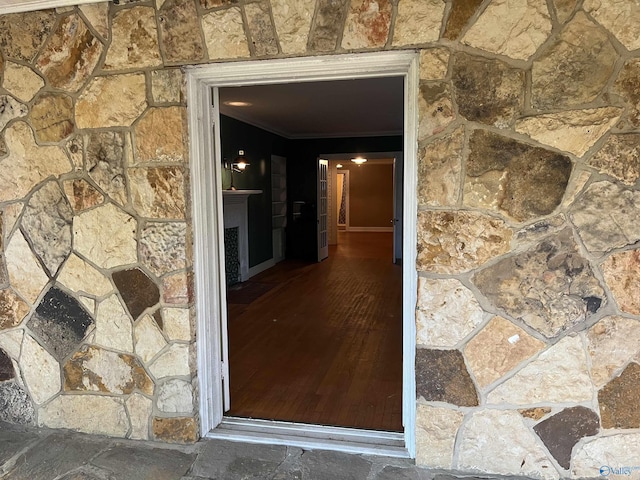 entrance to property with stone siding