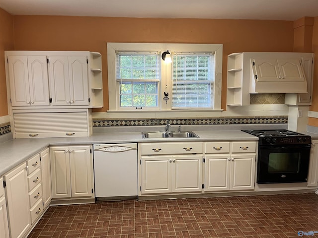 kitchen featuring a sink, open shelves, dishwasher, and black range oven