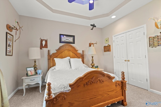 carpeted bedroom with recessed lighting, a closet, baseboards, and ceiling fan