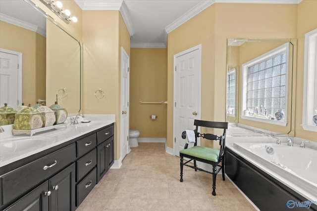 bathroom featuring crown molding, a garden tub, toilet, a sink, and double vanity