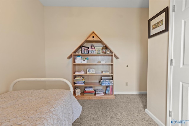 carpeted bedroom with baseboards