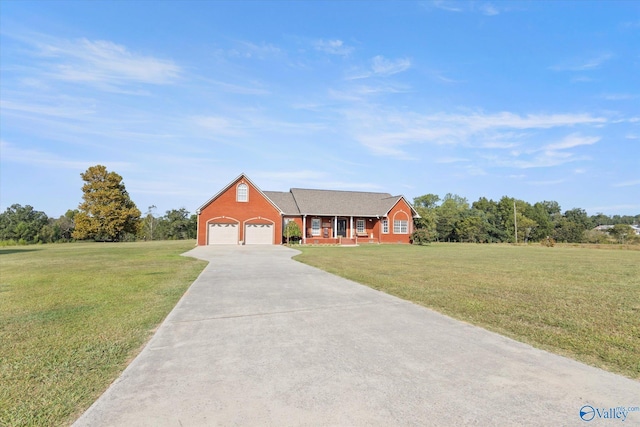 view of front of house with a porch, driveway, a front yard, and a garage