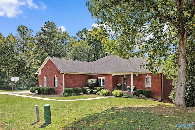 view of front of property with a front lawn