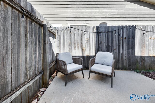 view of patio / terrace with fence