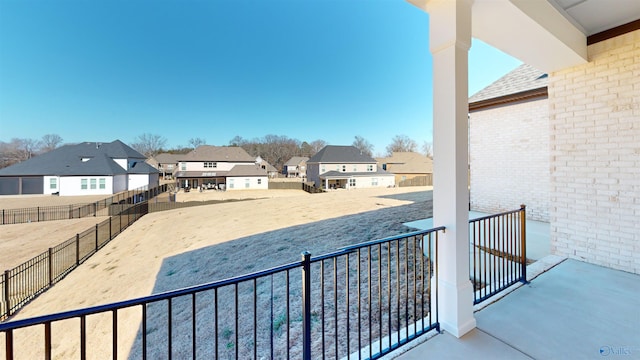 balcony featuring a residential view