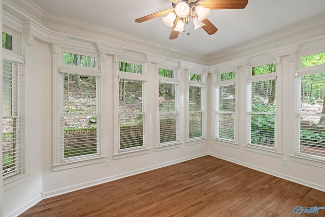 7925 Smoke Rise Rd SE, Huntsville, AL 35802 - unfurnished sunroom with ornamental molding and wood finished floors