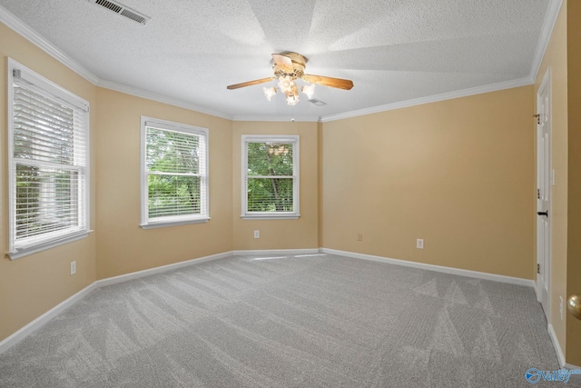 7925 Smoke Rise Rd SE, Huntsville, AL 35802 - unfurnished room featuring a ceiling fan, carpet floors, ornamental molding, and a textured ceiling