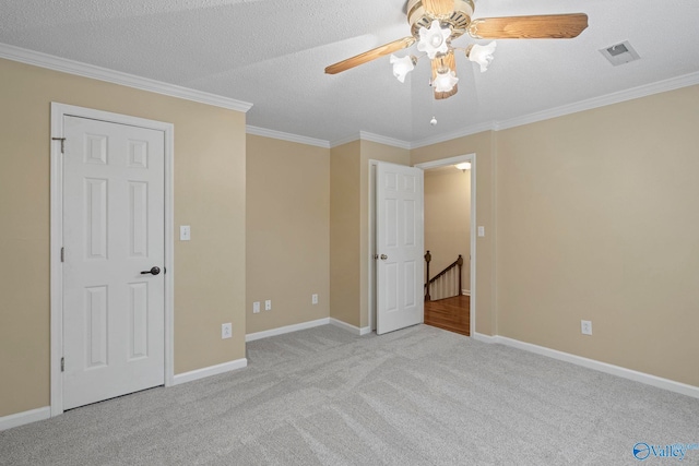 7925 Smoke Rise Rd SE, Huntsville, AL 35802 - unfurnished bedroom featuring carpet flooring, crown molding, and a ceiling fan