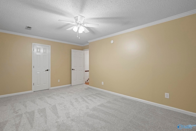 7925 Smoke Rise Rd SE, Huntsville, AL 35802 - unfurnished bedroom featuring crown molding, carpet flooring, a textured ceiling, and a ceiling fan