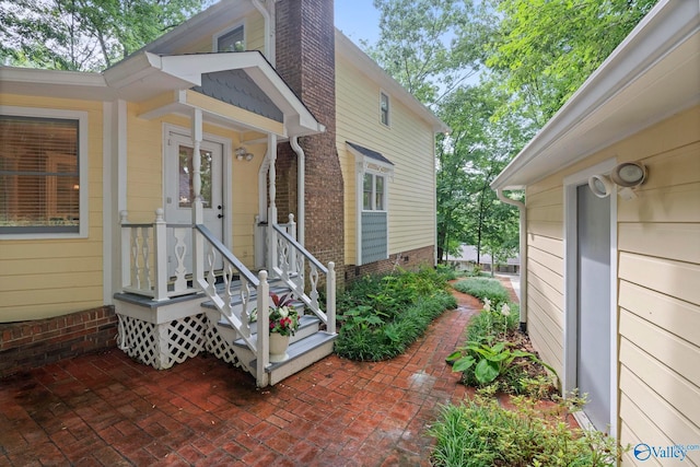 7925 Smoke Rise Rd SE, Huntsville, AL 35802 - entrance to property with a chimney and brick siding