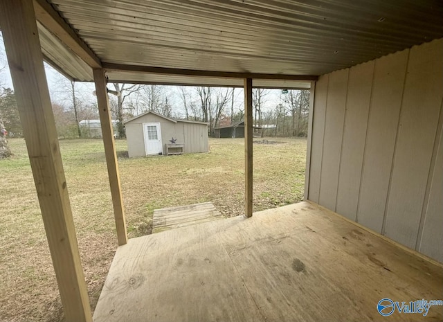 view of patio / terrace featuring a storage shed