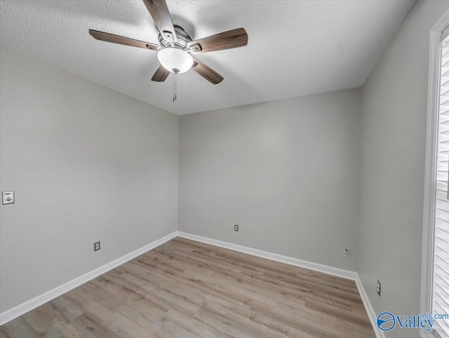323 Earnhardt Dr, New Market, AL 35761 - unfurnished room featuring ceiling fan, light wood-style flooring, a textured ceiling, and baseboards
