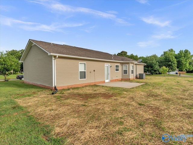 323 Earnhardt Dr, New Market, AL 35761 - rear view of property with a patio, a yard, central AC unit, and roof with shingles