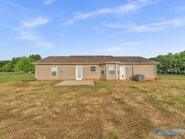 323 Earnhardt Dr, New Market, AL 35761 - rear view of property featuring a patio, central AC unit, and a lawn