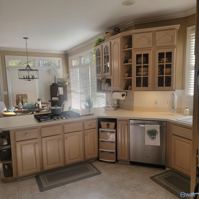 kitchen featuring a chandelier, light brown cabinetry, stainless steel appliances, and a wealth of natural light