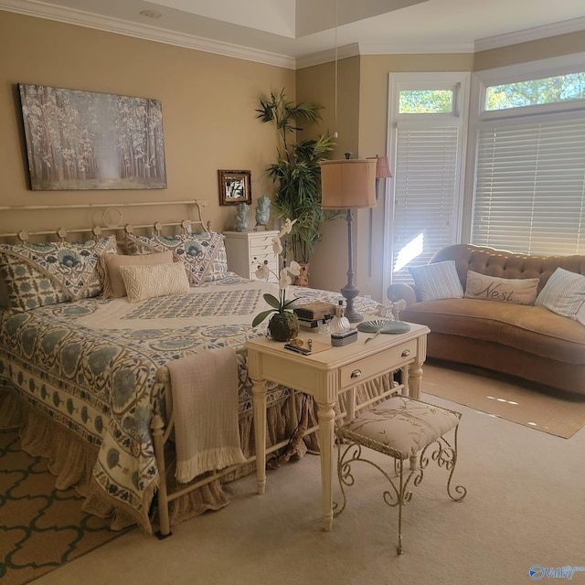 carpeted bedroom with ornamental molding