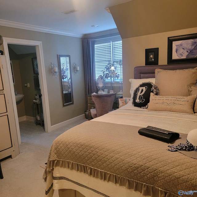 bedroom with connected bathroom, crown molding, and light carpet