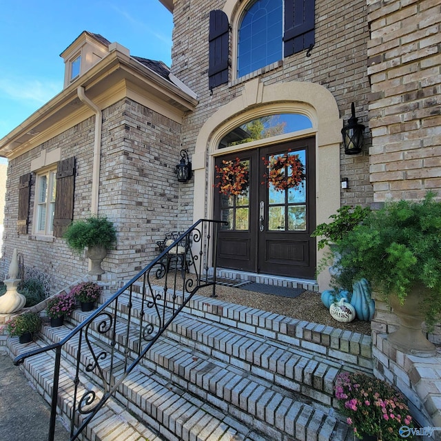 entrance to property featuring french doors