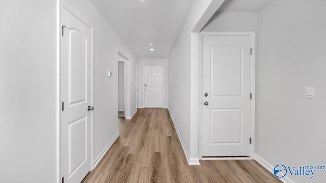 hall featuring light hardwood / wood-style flooring