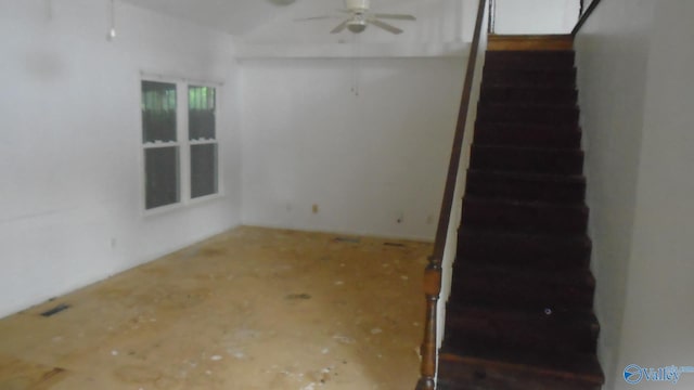 interior space featuring ceiling fan