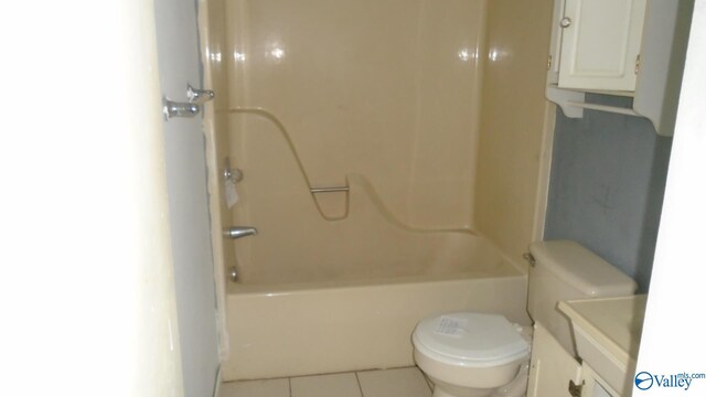 full bath with vanity, tub / shower combination, tile patterned flooring, and toilet